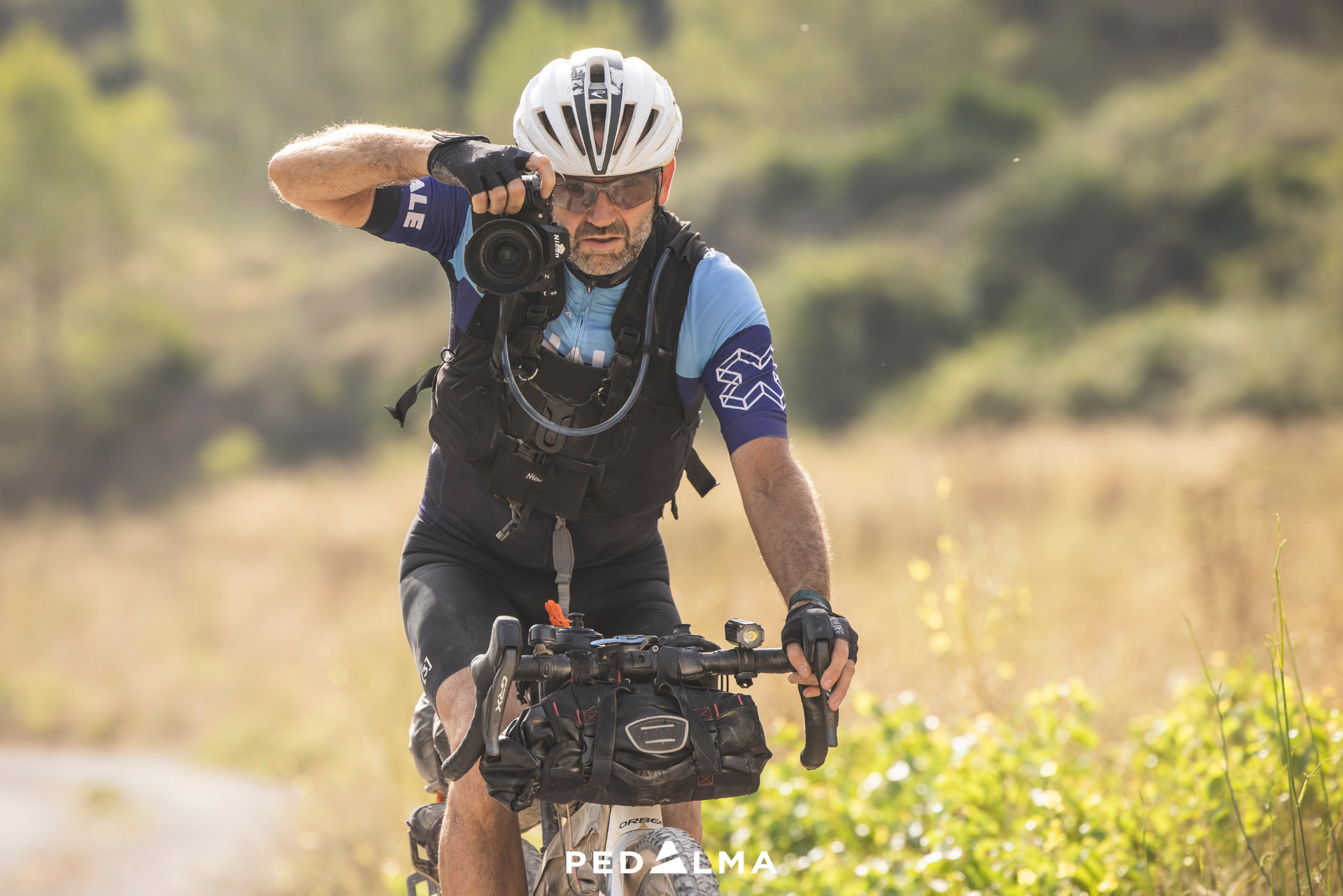 Mark Livesey filming from the bike during an endurance event