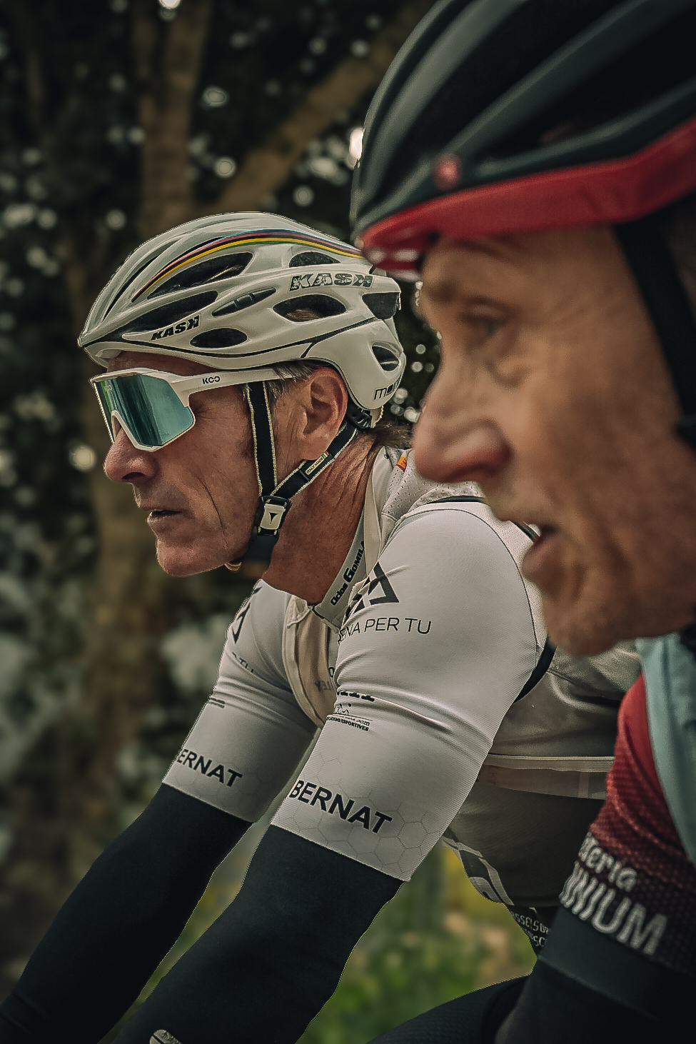 Two riders in profile during a road ride