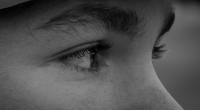 Close up black and white detail of an athlete's eye